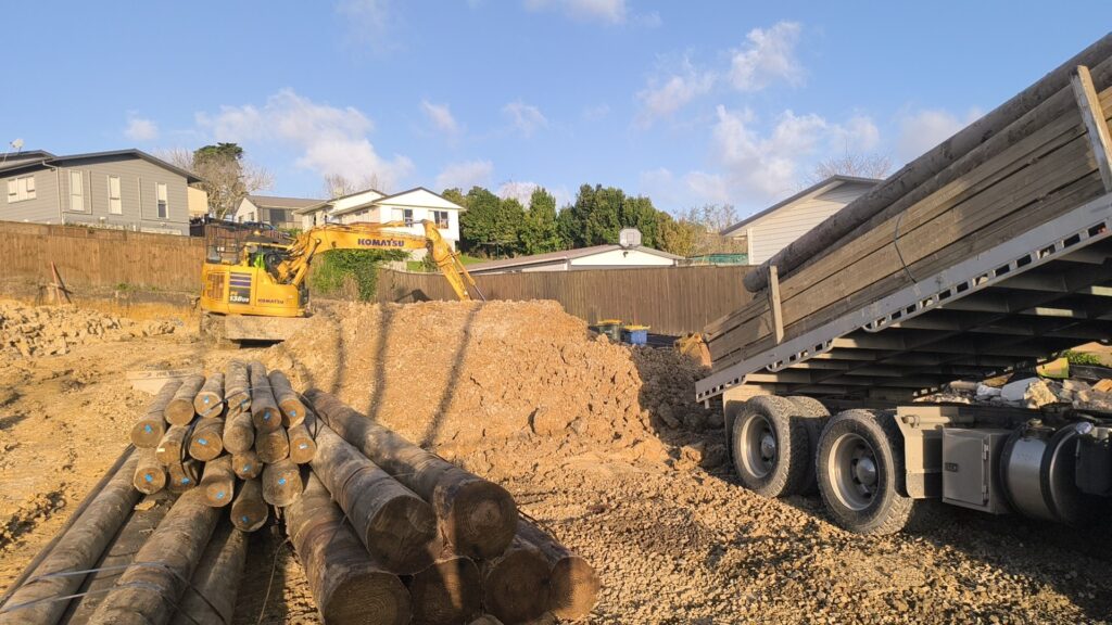 Excavator and truck during site earthworks