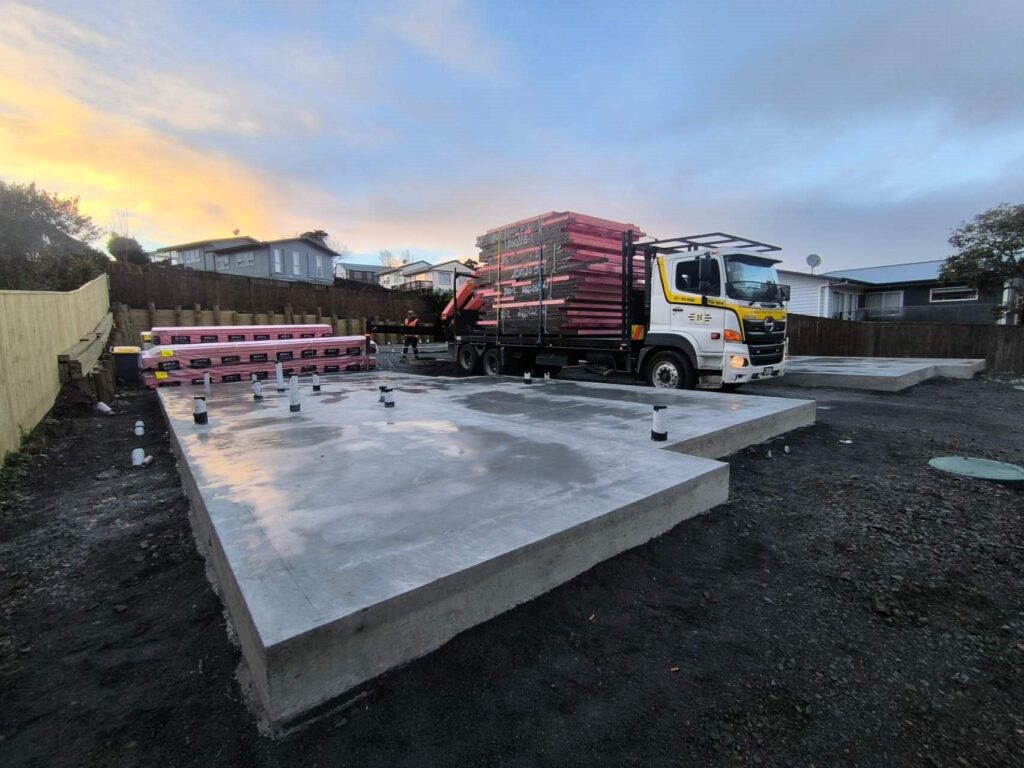 Timber wall frames stacked on the slab