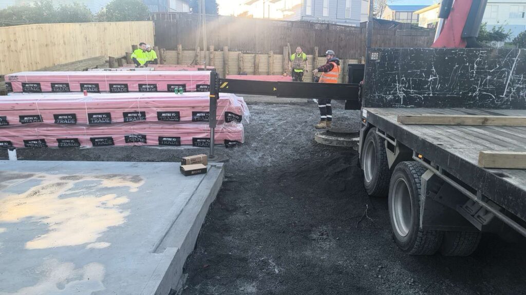 Truck delivering timber wall frames