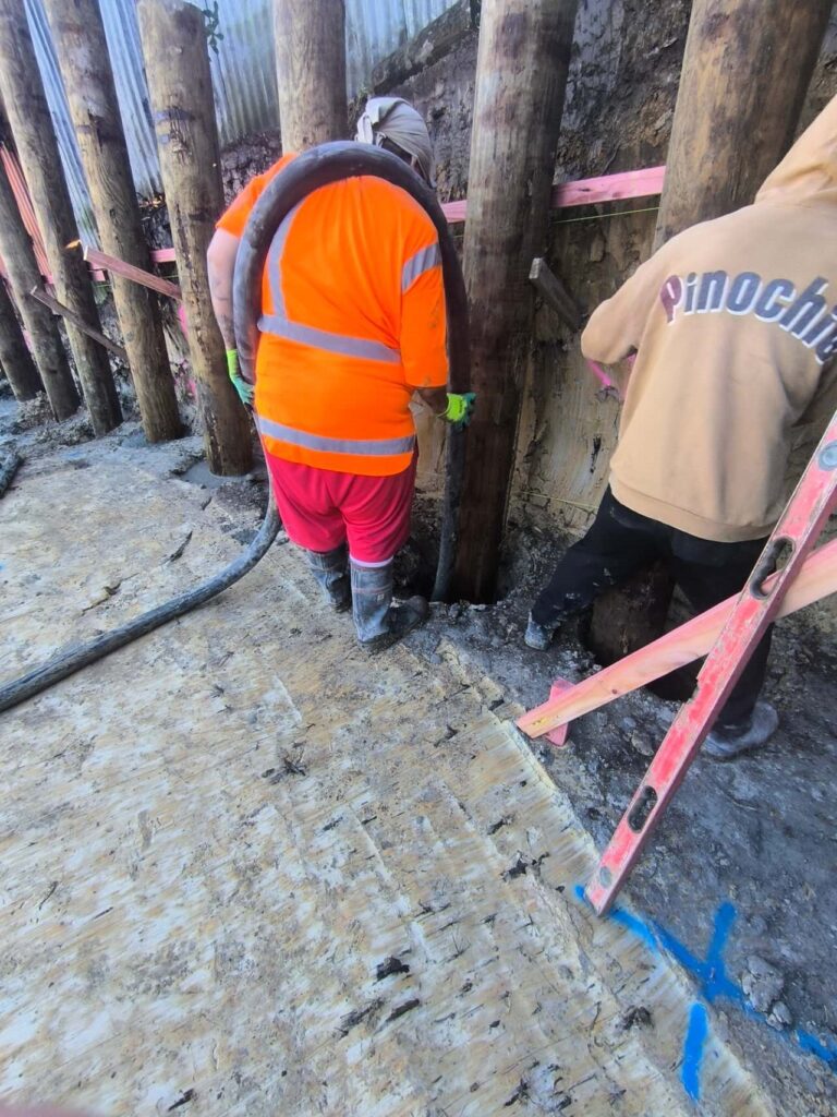 Concrete works for a pole retaining wall